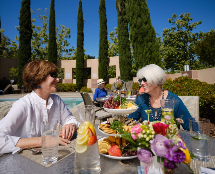 Women enjoying a snack outside