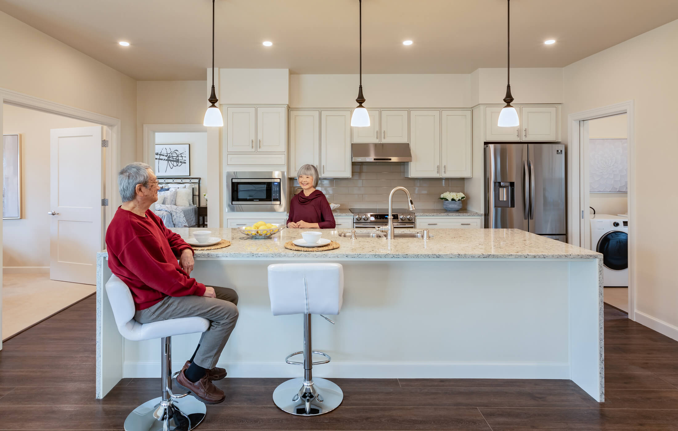 Couple enjoying their kitchen