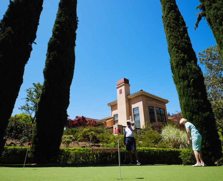 Couple playing golf